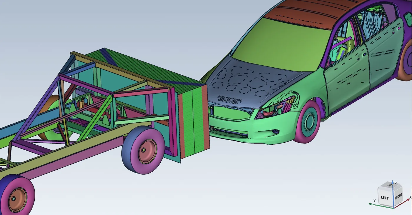 Side-impact crash model with barrier and vehicle, coloured by part